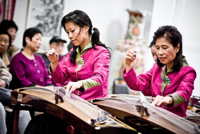 2.01.2009 CCCC 2009 Chinese New Year Celebration (5).jpg - Febuary 1st is the Chinese New Year.  Every year the Chinese community in Washington D.C. celebrates the New Year with a small parade with local dignateries, traditional dancing, music, and demonstrations of their heritage.  Firecrackers are traditionally ignited during the ceromony, but this year the firecracker that was hoisted up 4 stories high was never ignited because there was a gas leak reported in the area.  The dissapointed crowd regardless enjoyed themselves with displays of lyon dances and drumming.